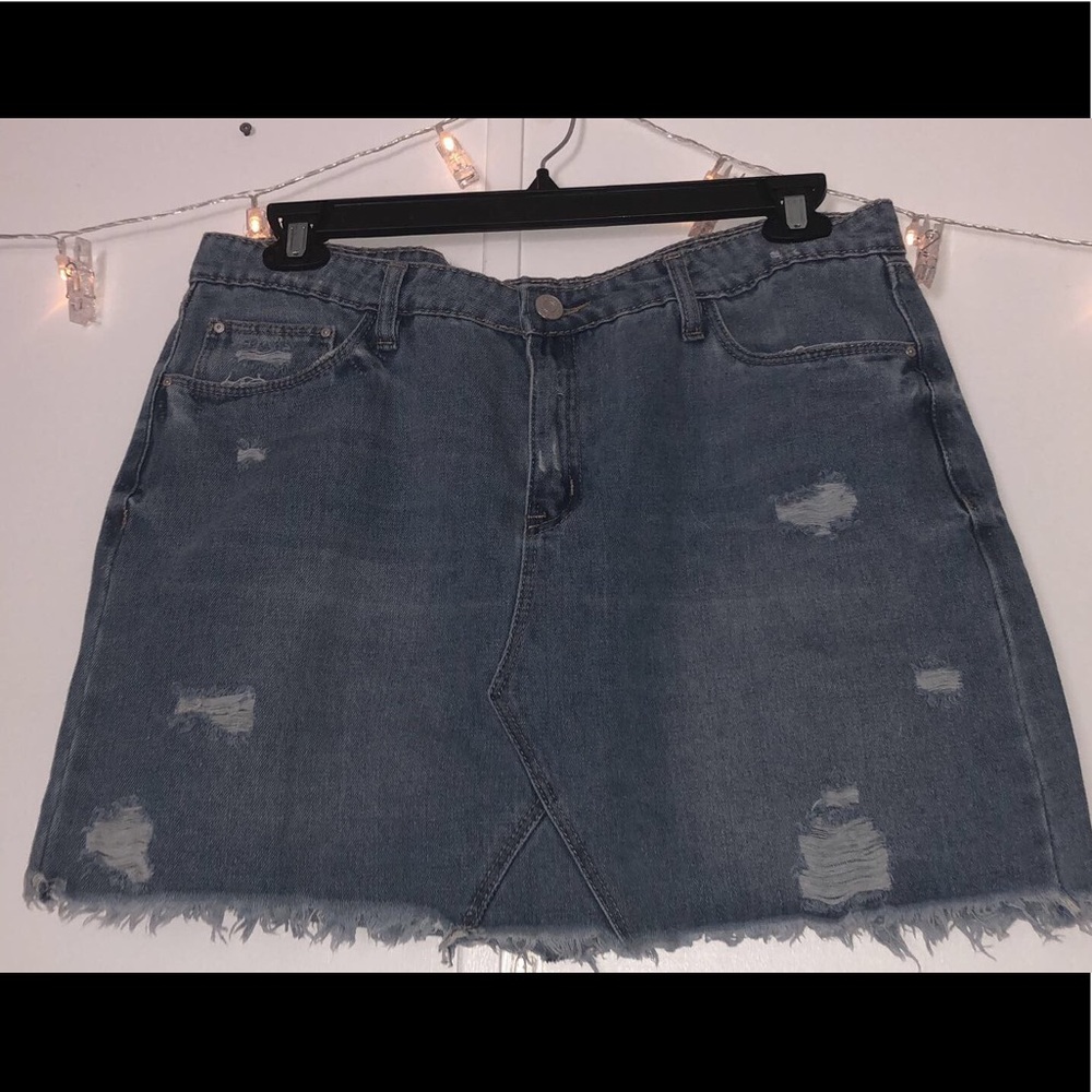 Light wash denim, ripped mini skirt